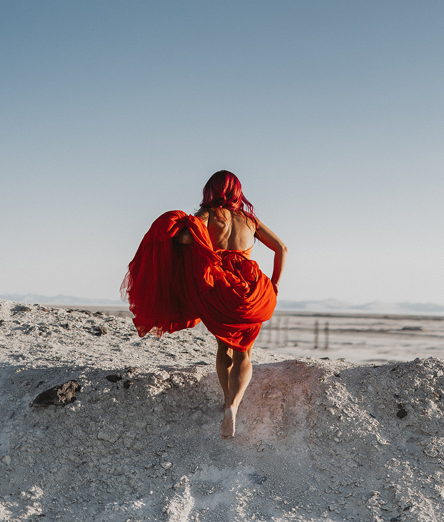 girl running away at the salt flats