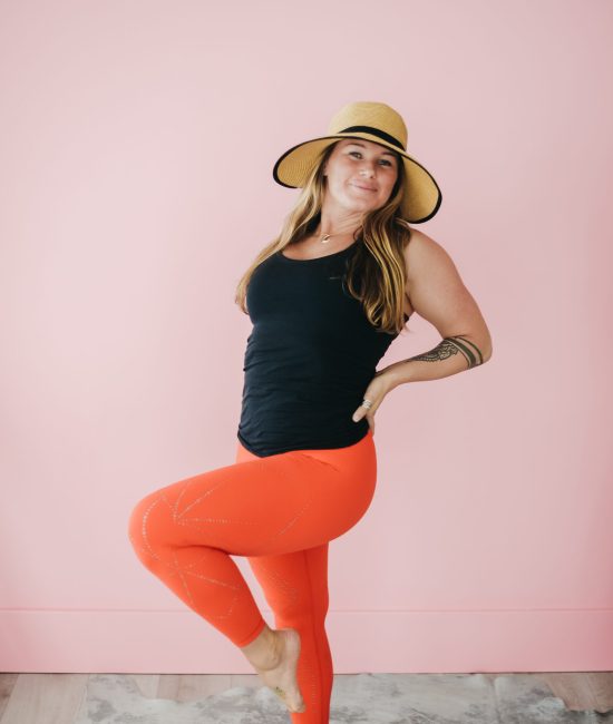 a woman in yoga clothes