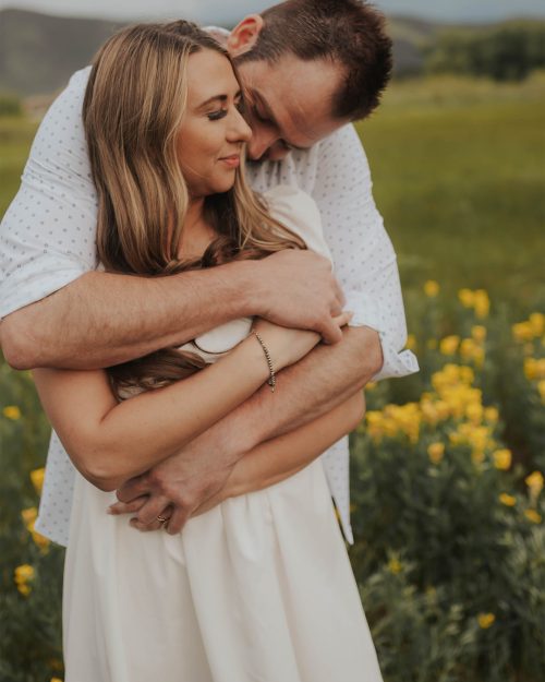 Engagement Session in a meadow near the reservoir